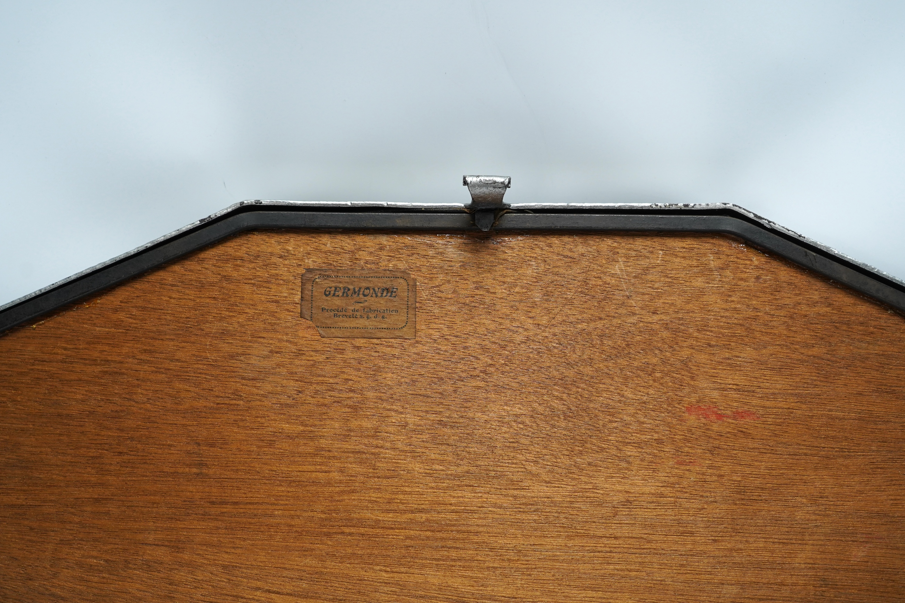 An Art Deco reverse painted and wrought iron tray, with a gallery, centered with a reverse painted landscape scene, signed 'Germonde', 70cm. Condition - damaged